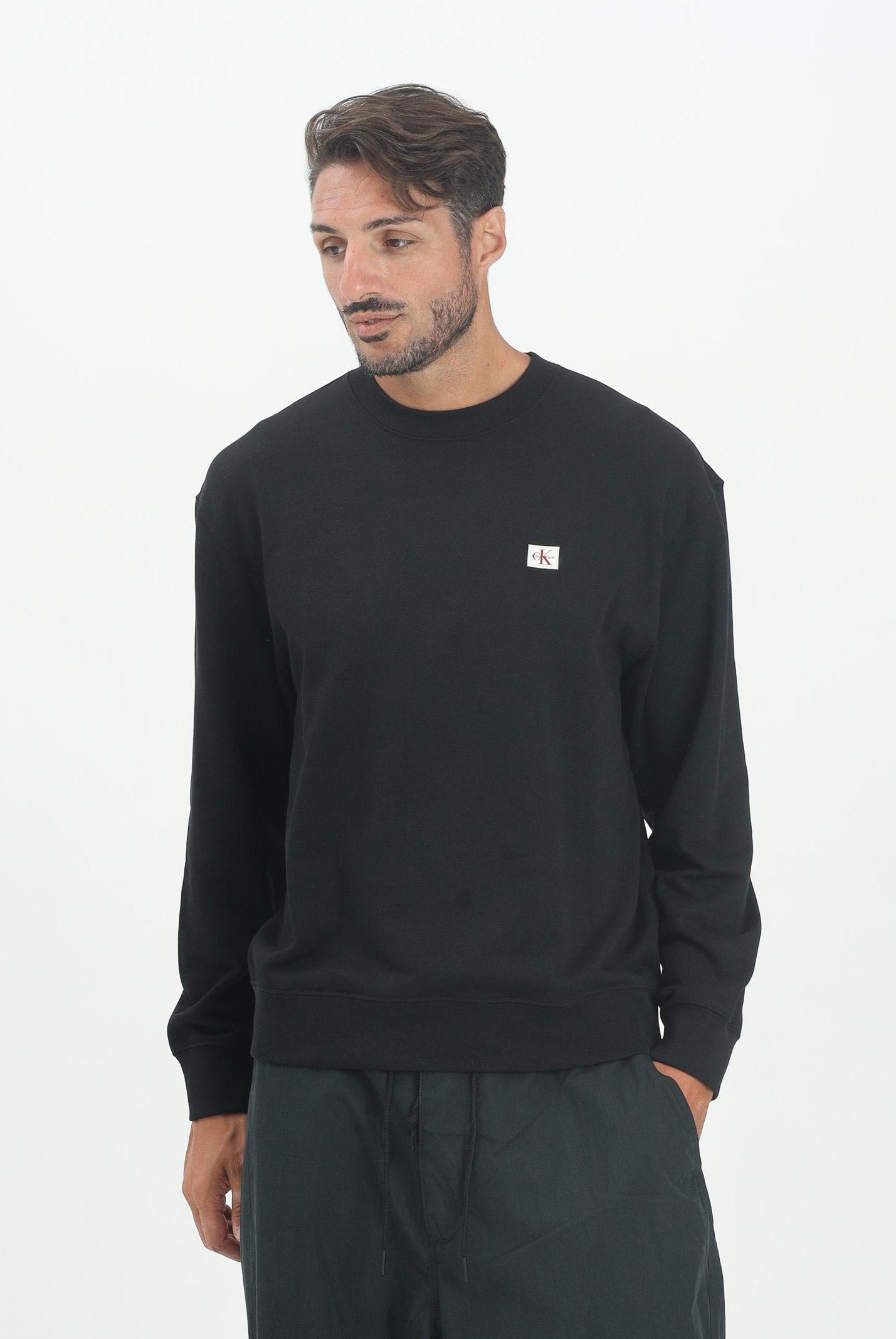 CALVIN KLEIN JEANS Felpa girocollo nera da uomo con stemma monogramma LV04RC273GUB1 CALVIN KLEIN JEANS