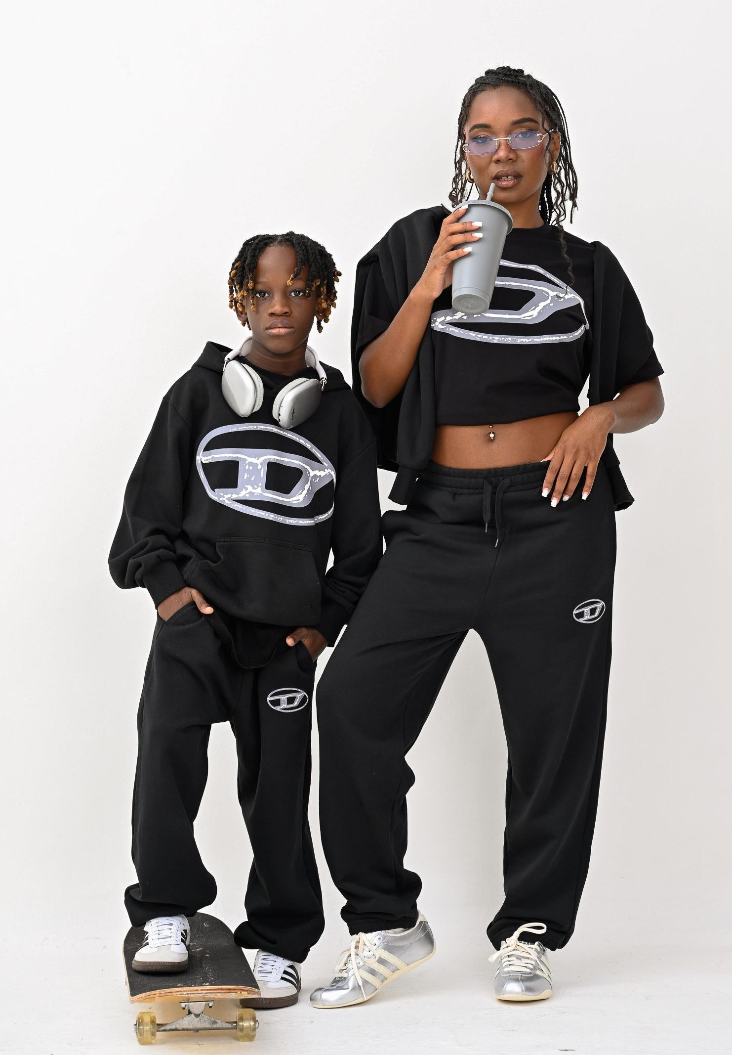 DIESEL Felpa con cappuccio nera per donna, ragazzi e bambini con maxi logo Oval D J02487KYAQK K900 DIESEL