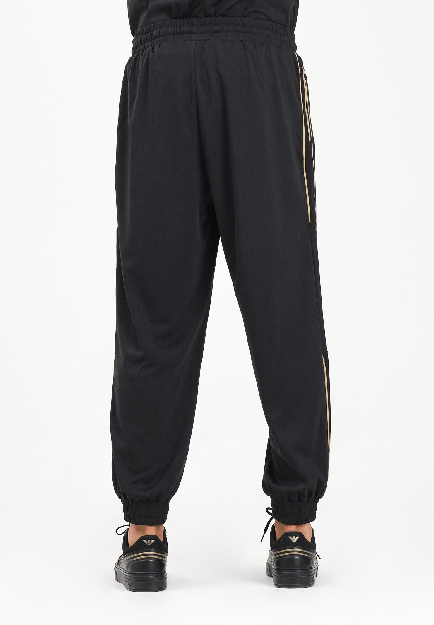 EA7 Pantalone sportivo nero da uomo con bande laterali e logo 7M000622AF17089 UC001 EA7