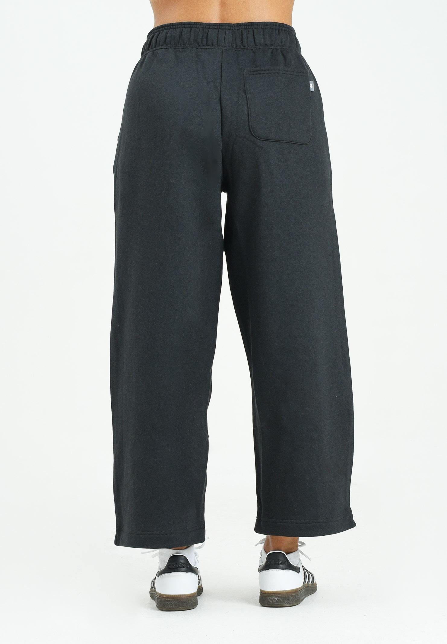 NEW BALANCE Pantalone sportivo Linear Heritage Fleece Barrel nero da donna WP53500BK . NEW BALANCE