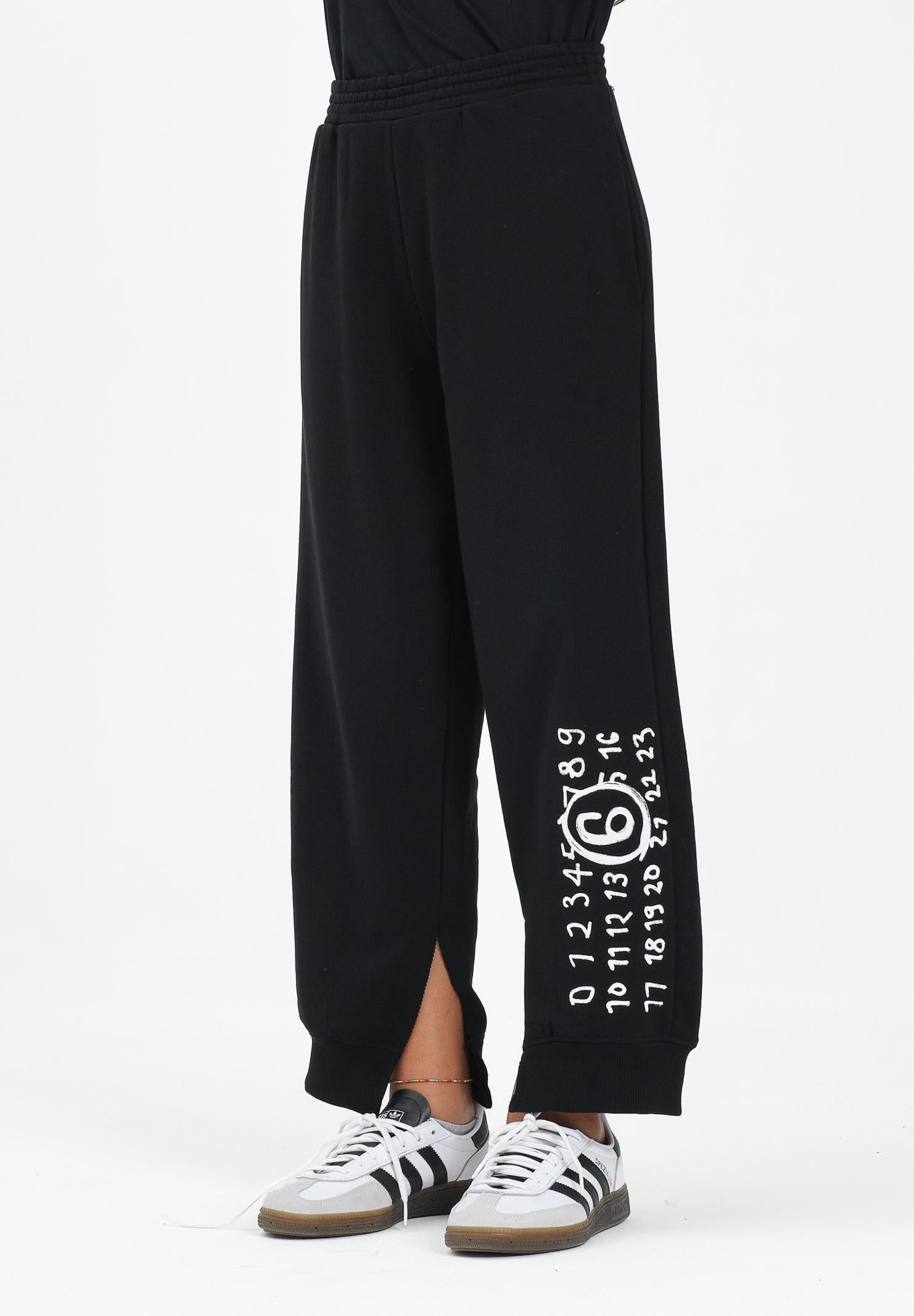 MAISON MARGIELA Pantalone sportivo nero per donna, ragazzi e bambini con spacchetti interni alla caviglia M60895MM02X M6900 MAISON MARGIELA