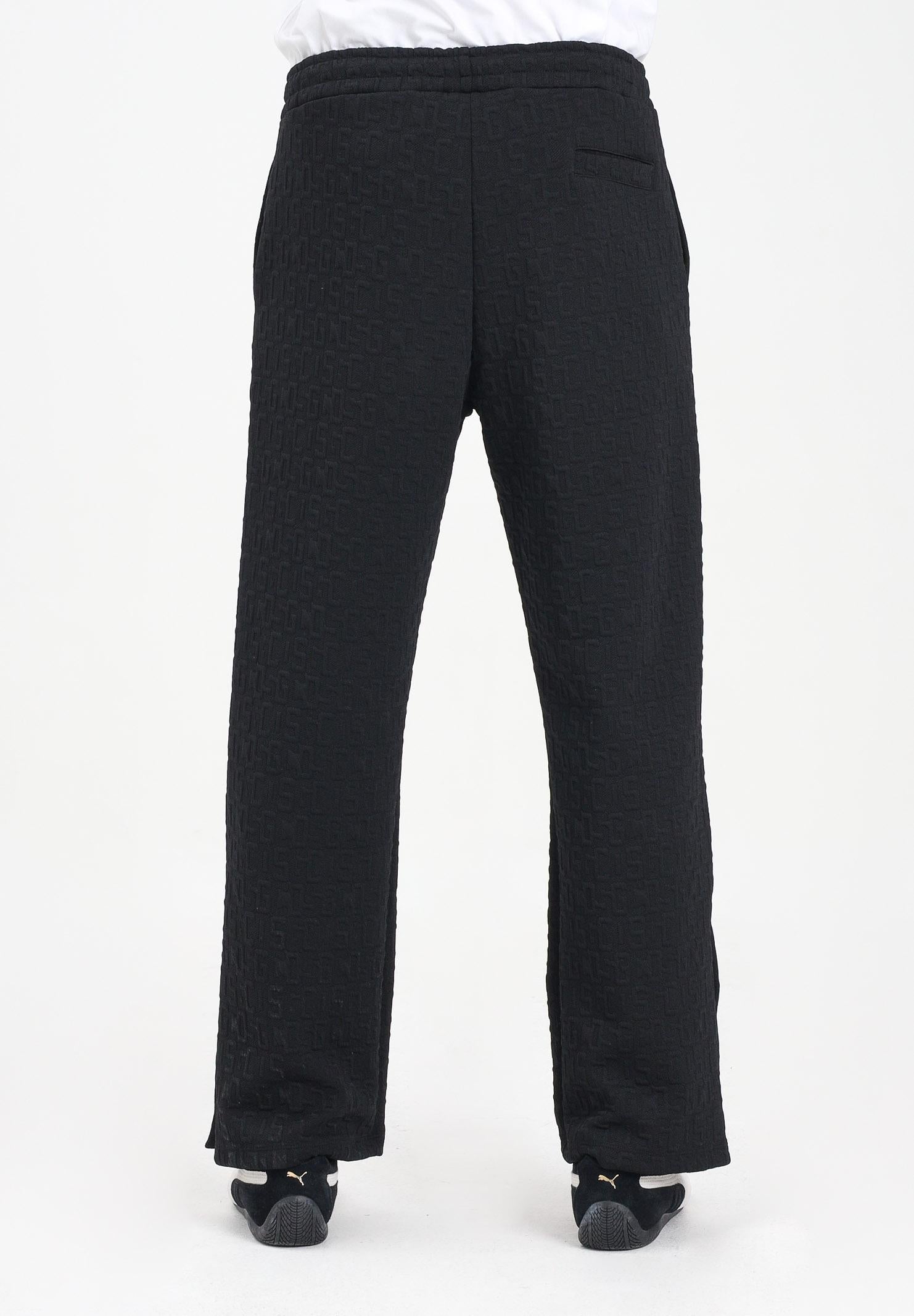 GCDS Pantalone sportivo nero per uomo e donna con lavorazione jacquard del logo B2CM3010TQ6 99 GCDS