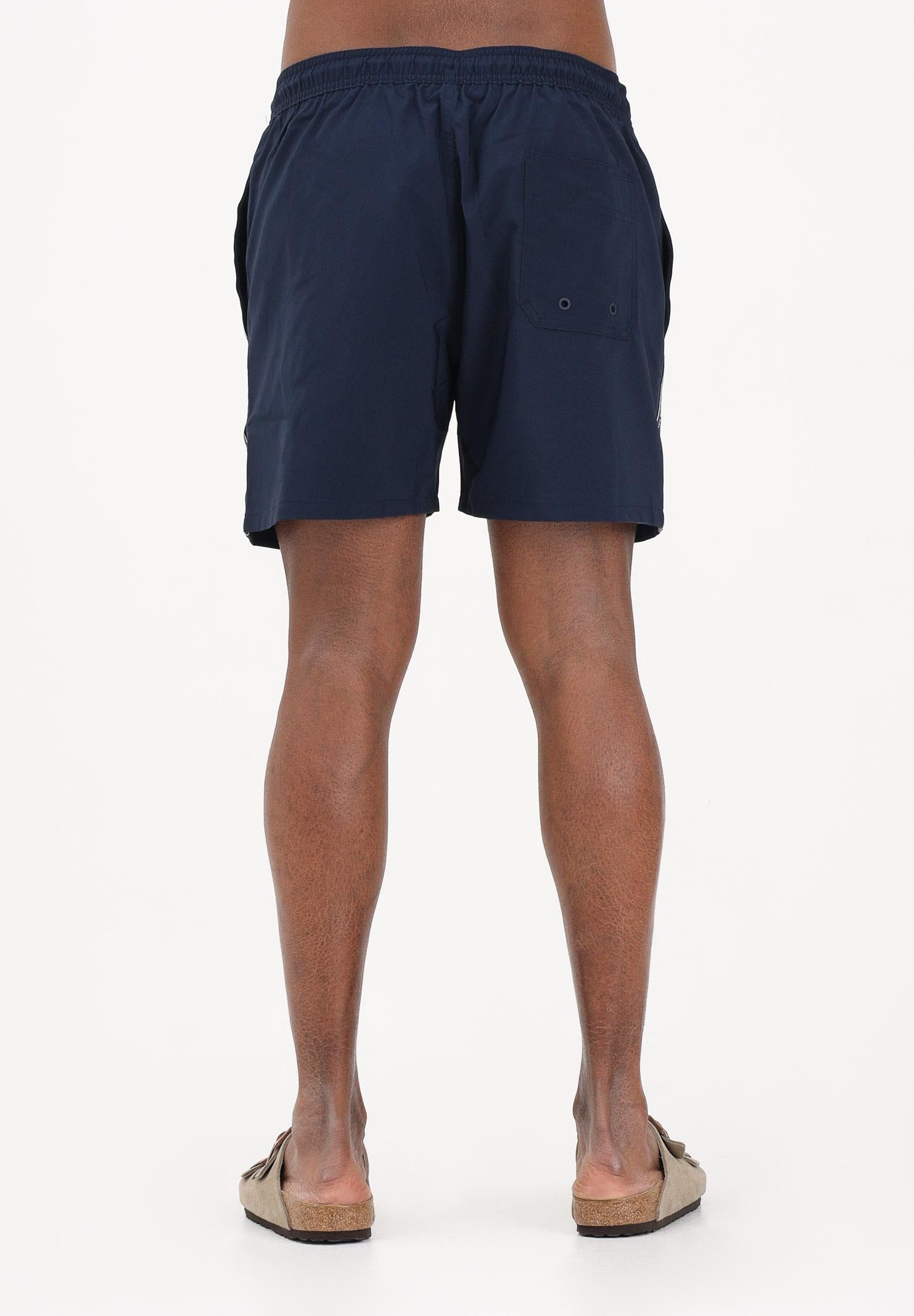 CALVIN KLEIN Shorts mare blu da uomo arricchito da banda laterale con logo LV00N61002 0PP CALVIN KLEIN