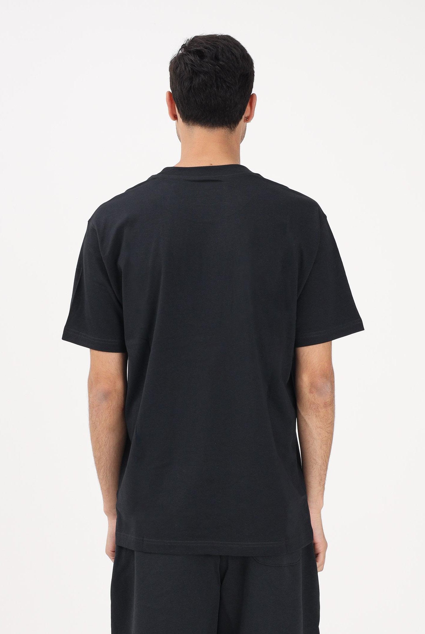 NEW BALANCE T-shirt a manica corta Sport Essentials nera per uomo e donna MT41509BK . NEW BALANCE