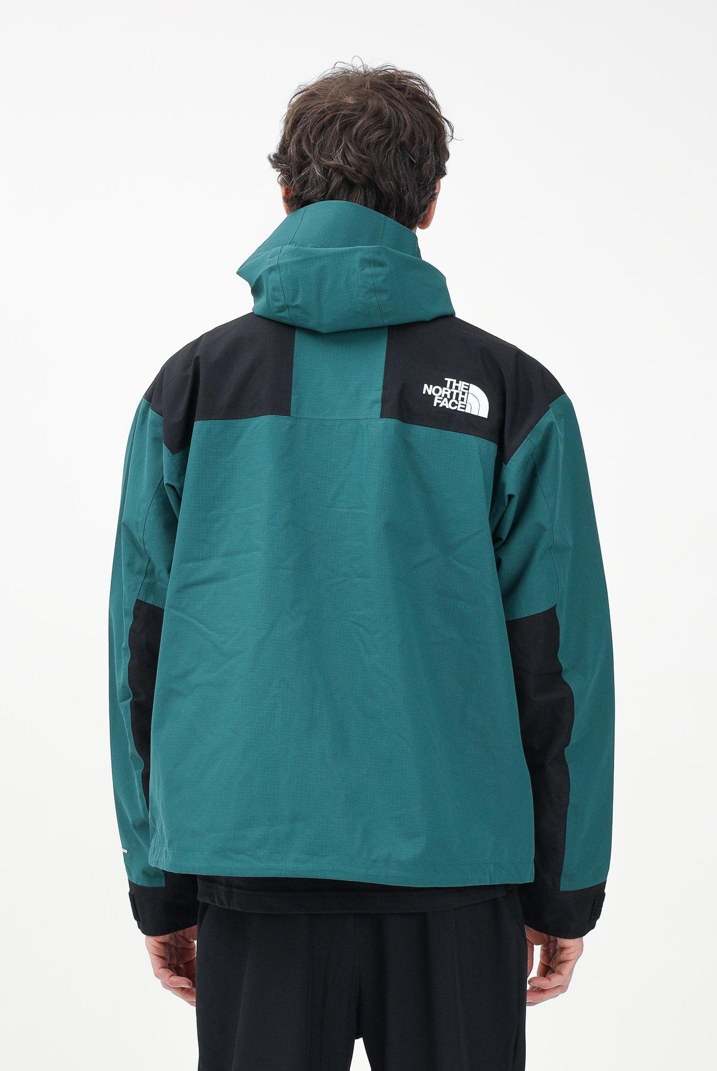 THE NORTH FACE Giacca a vento Mountain Mono verde da uomo NF0A88XF5861 . THE NORTH FACE