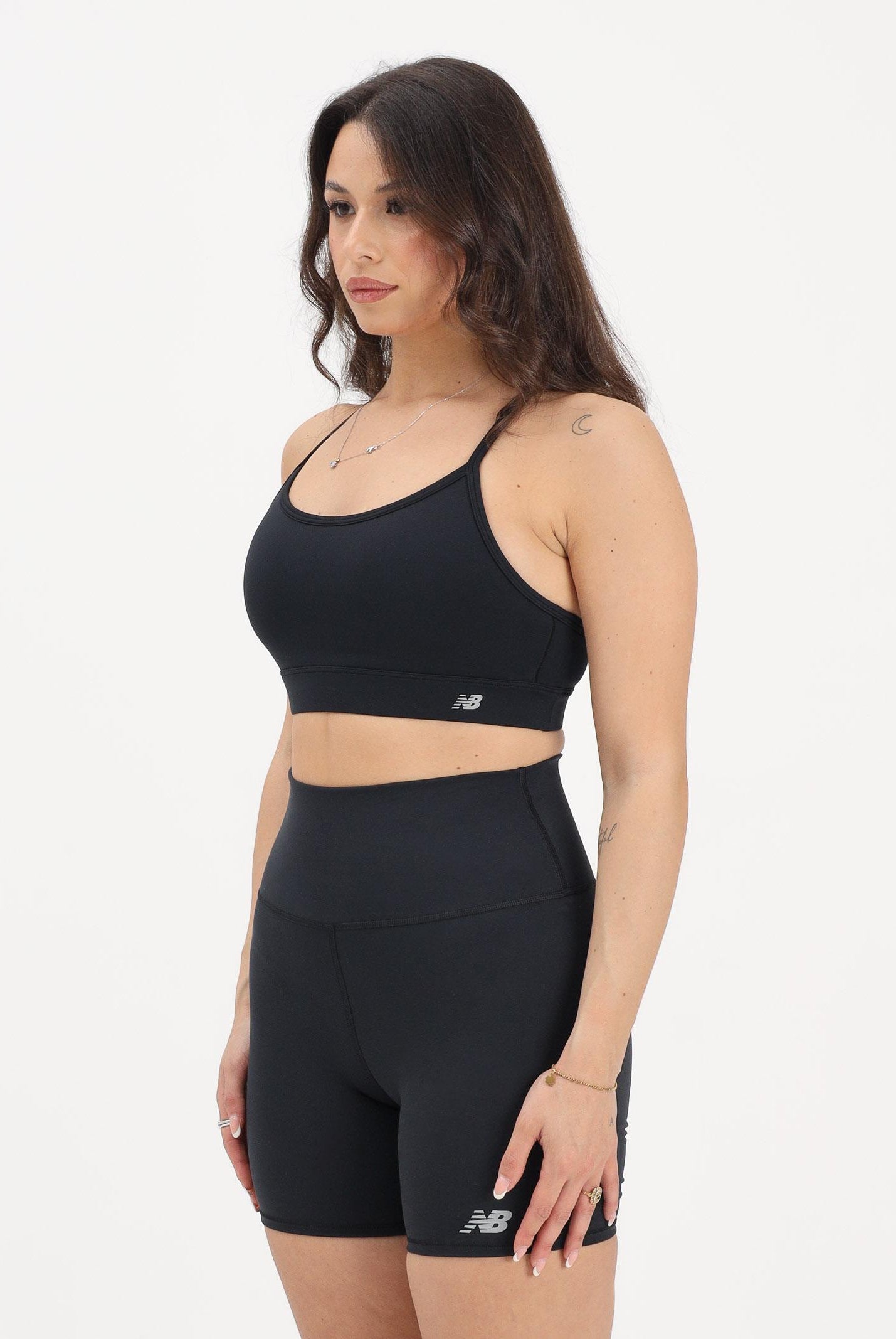 NEW BALANCE Top sportivo NB Essential nero da donna WB51039BK . NEW BALANCE