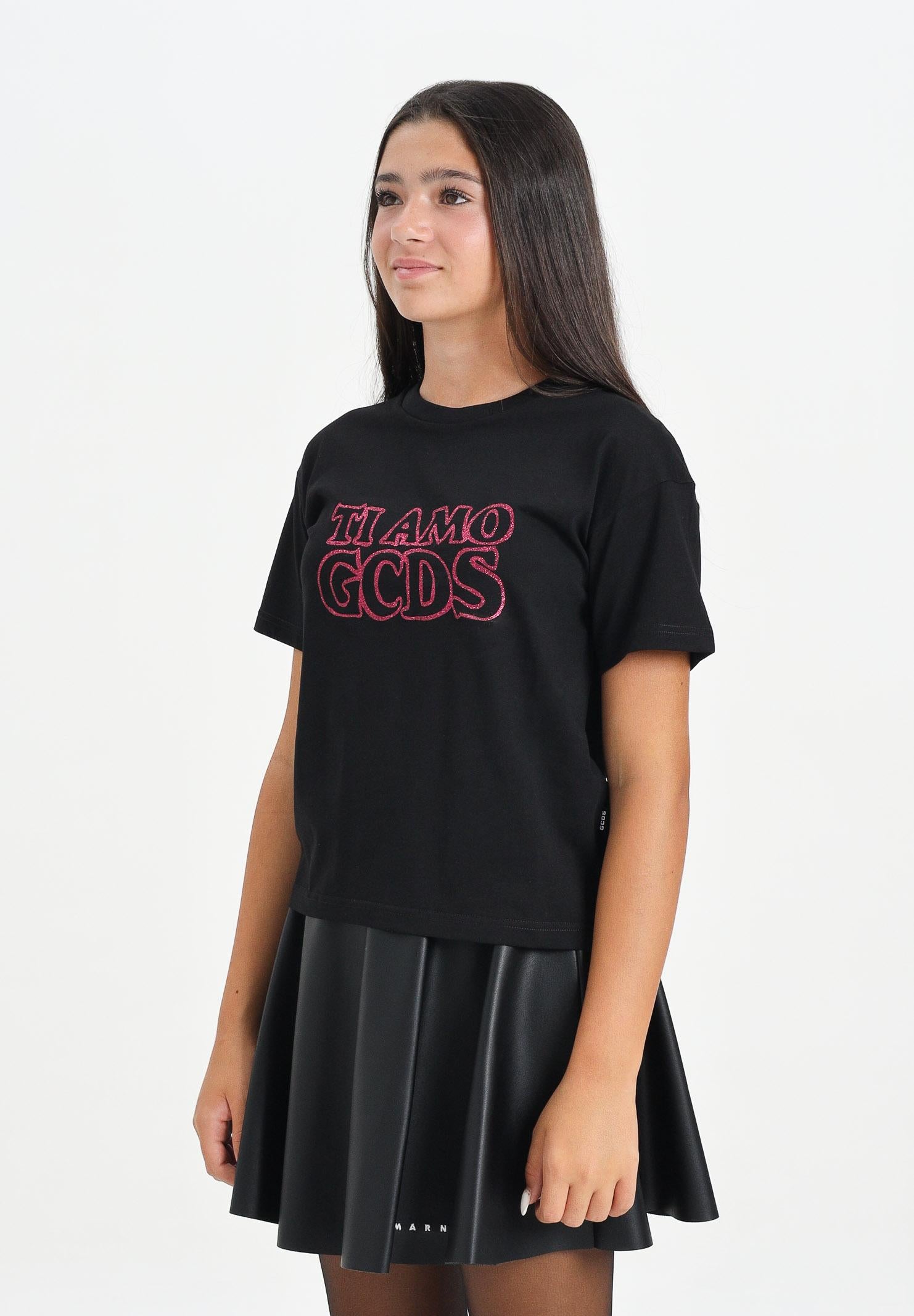 GCDS T-shirt a manica corta nera per donna e bambina con stampa glitterata TI AMO GCDS B2JW2335BA3 99 GCDS