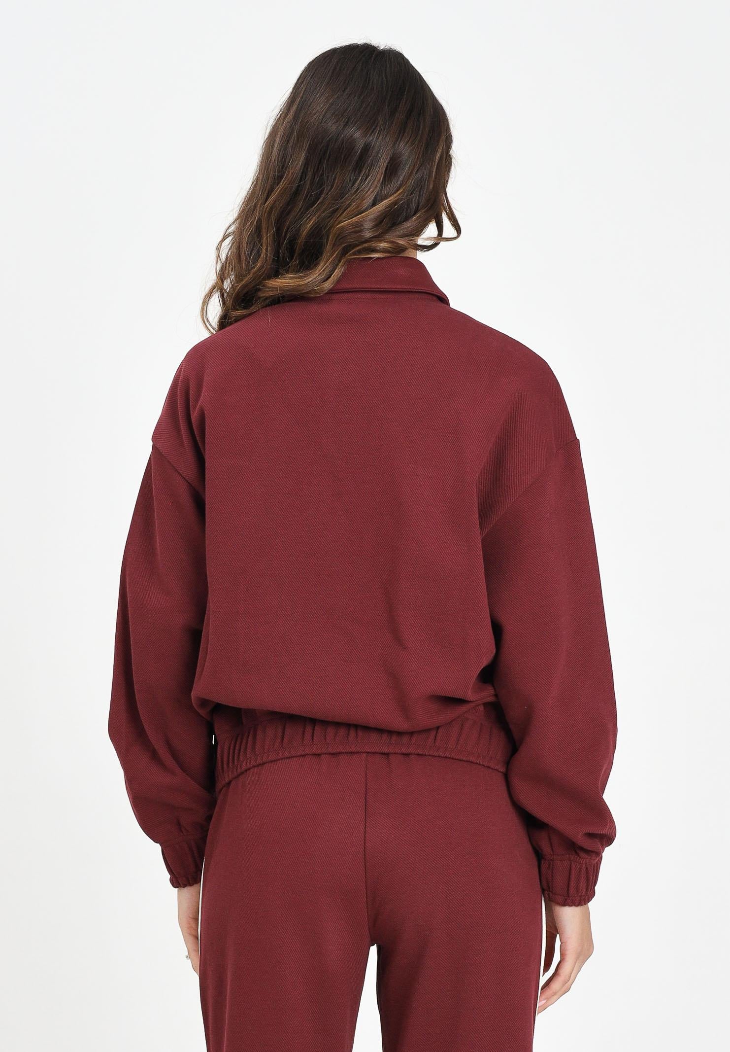 PUMA Felpa con zip T7 bordeaux da donna 632137 96 PUMA