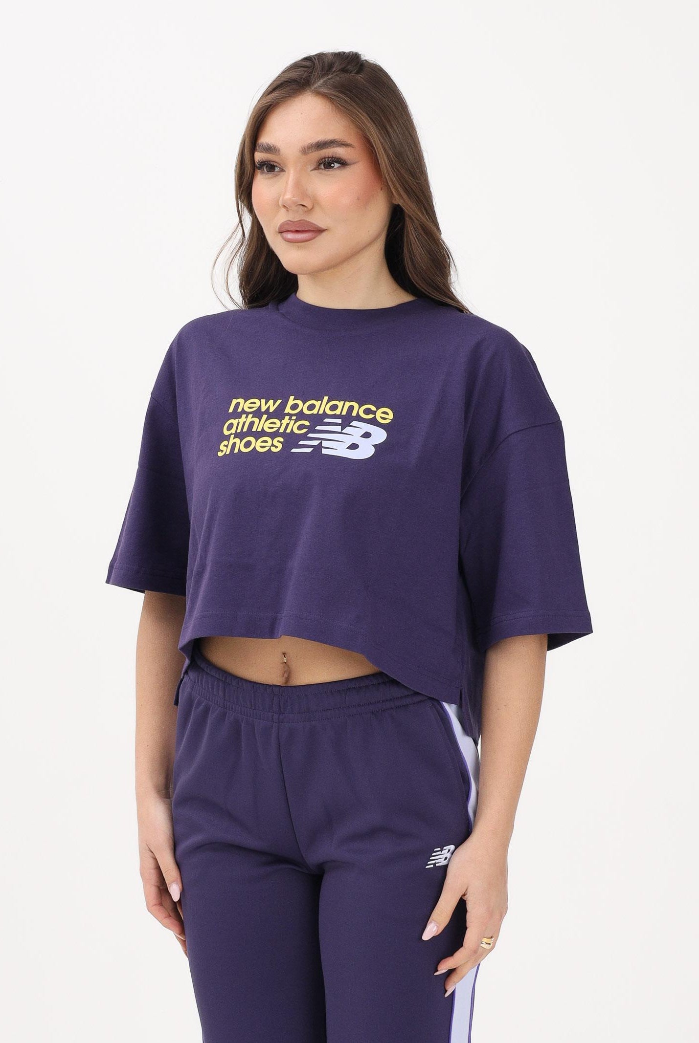 NEW BALANCE T-shirt a manica corta Athletics Premium Chest Logo viola da donna WT51908BOY . NEW BALANCE