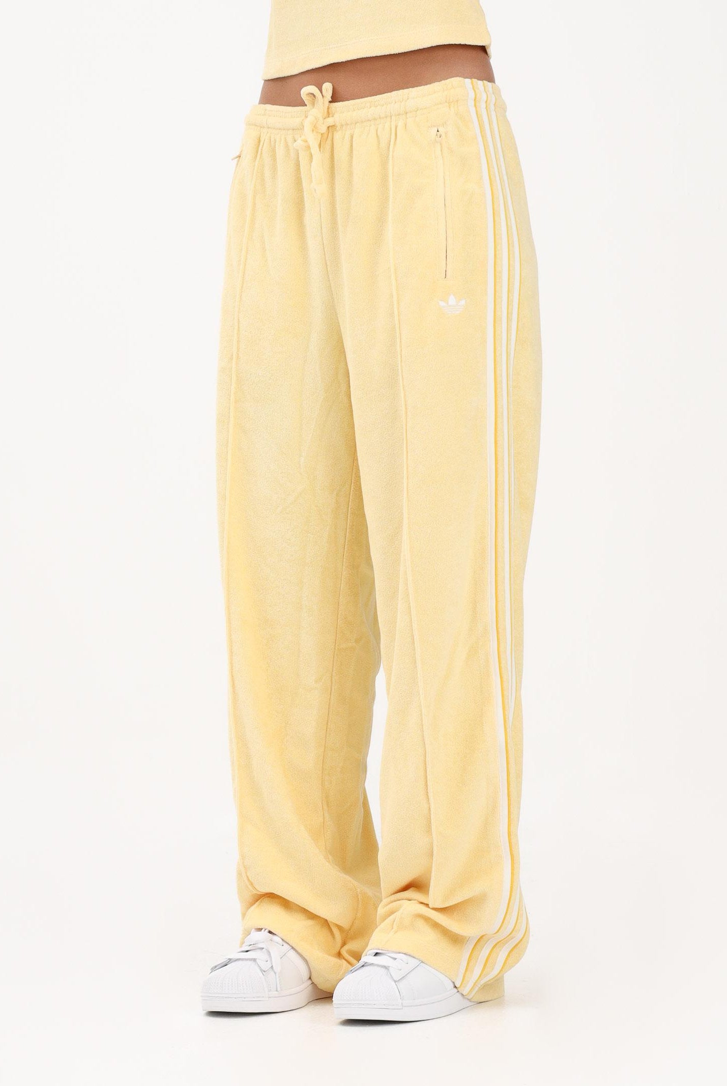 ADIDAS ORIGINALS Pantalone sportivo in spugna asciugamano Firebird giallo da donna KD1413 . ADIDAS ORIGINALS