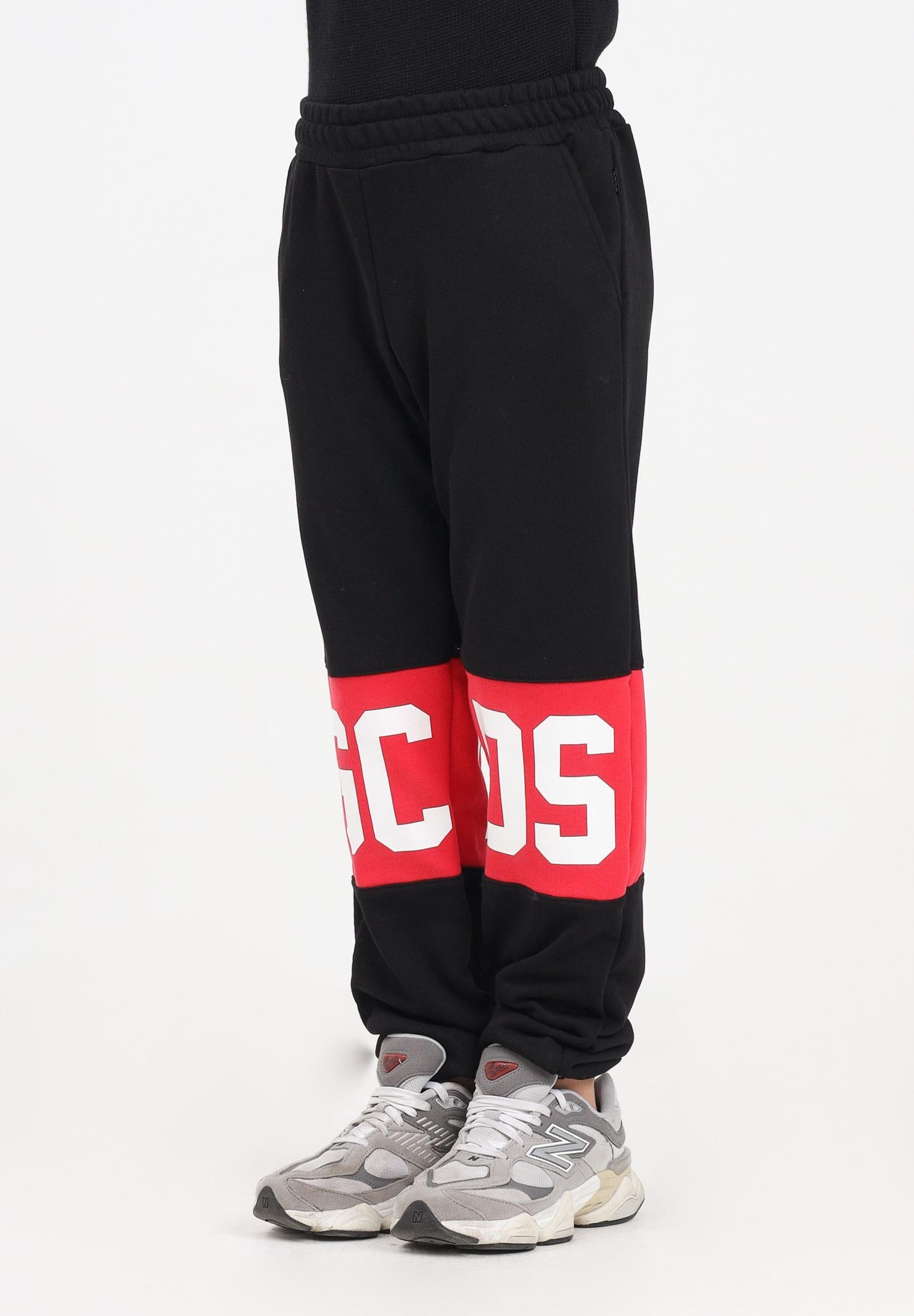 GCDS Pantalone sportivo nero per donna, ragazzi e bambini con fascia a contrasto e logo B2JU3017BA2 99 GCDS