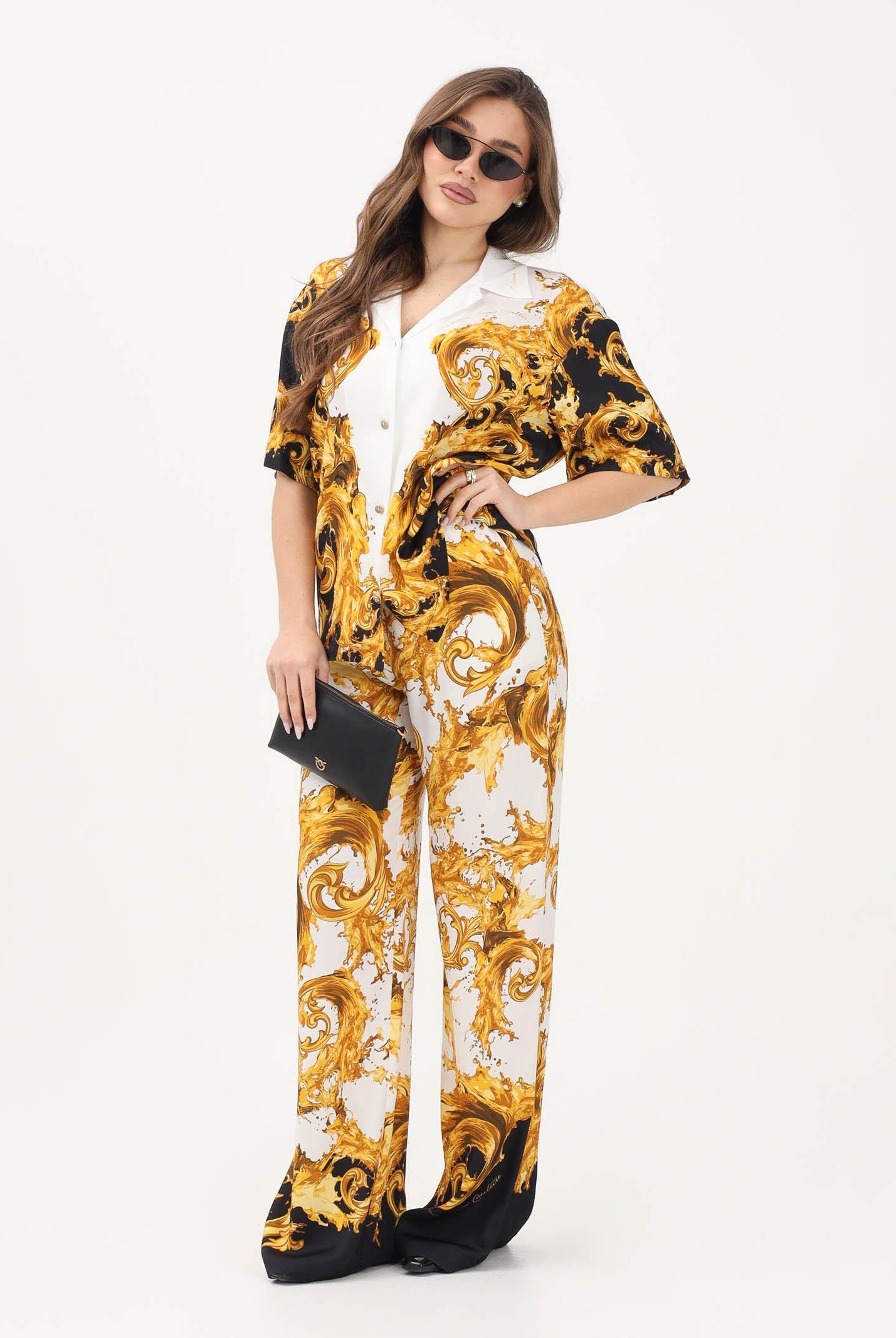 VERSACE JEANS COUTURE Pantalone bianco e nero da donna con stampa Wave Couture 80HAA1P2NS833 GL1 VERSACE JEANS COUTURE