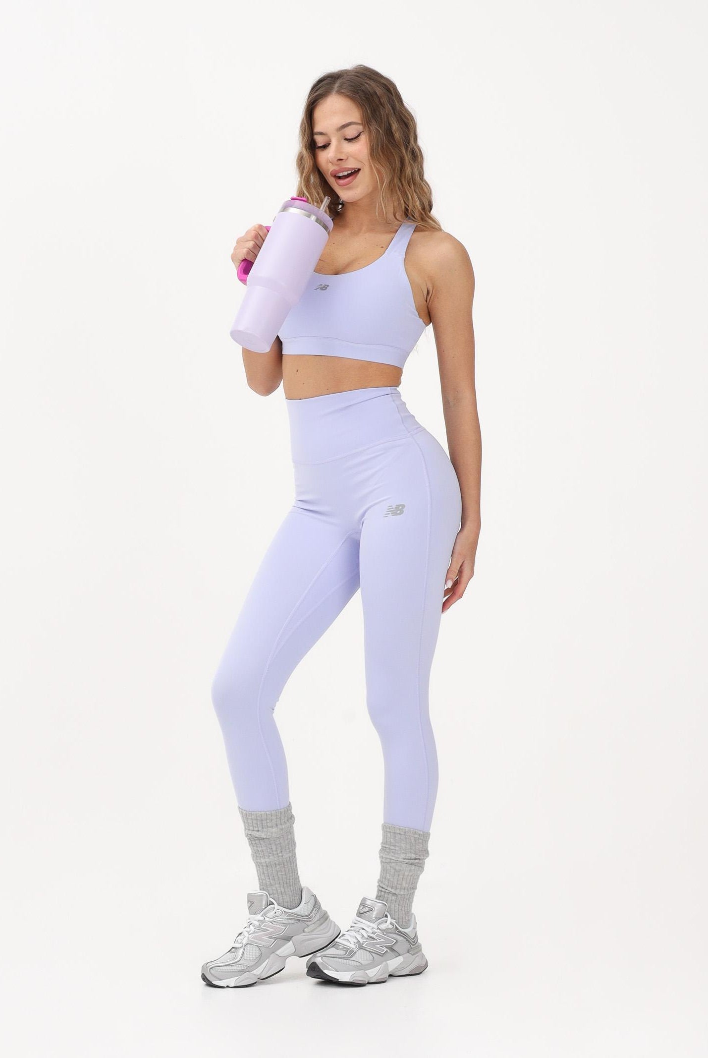 NEW BALANCE Bralette sportiva NB Essential lilla da donna WB51035DYK . NEW BALANCE