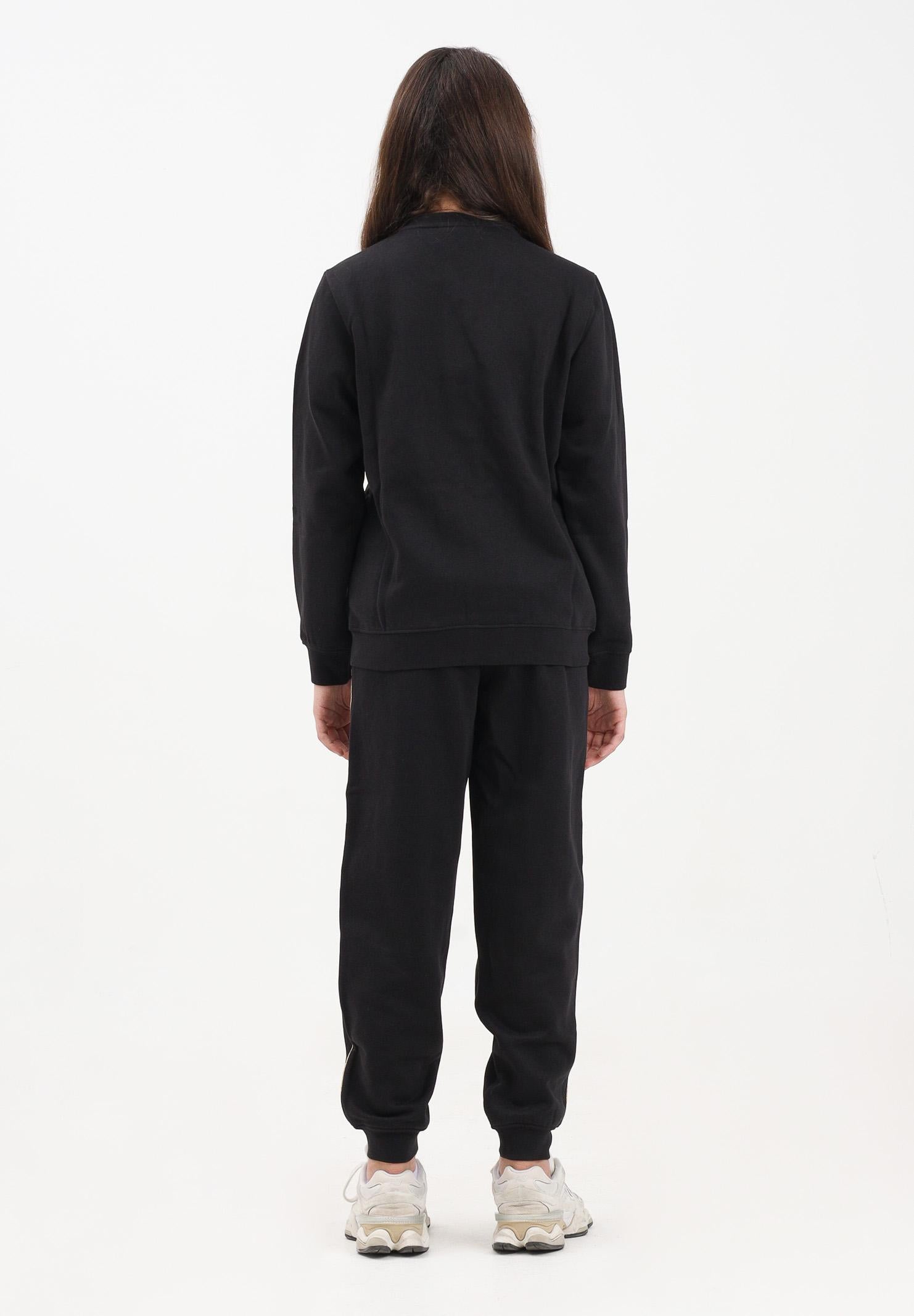 PUMA tuta nera per bambina con dettagli dorati 692212 01 PUMA