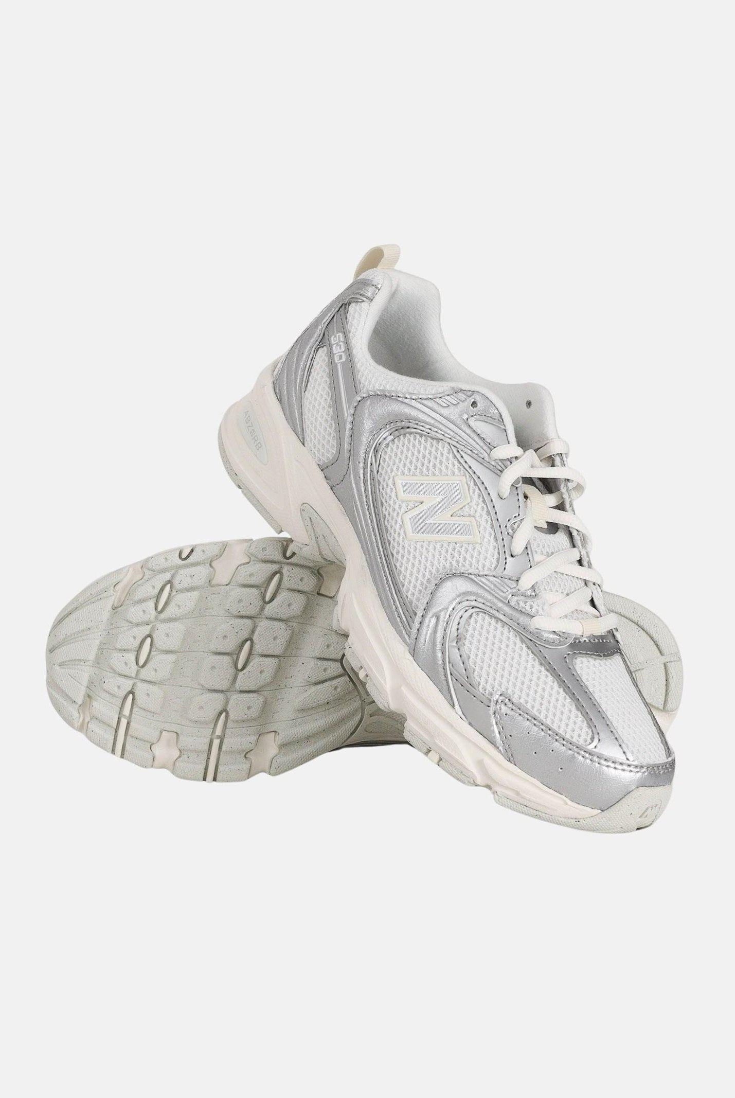 NEW BALANCE Sneakers 530 bianca e argento per uomo e donna U5303IR . NEW BALANCE