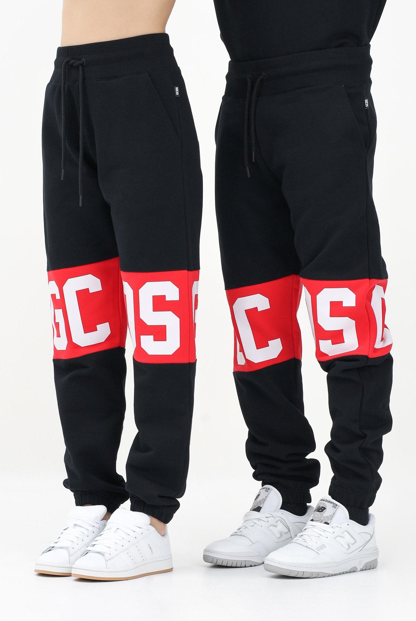 GCDS Pantalone sportivo nero per uomo e donna con banda logo B1XM3001JD1 99 GCDS