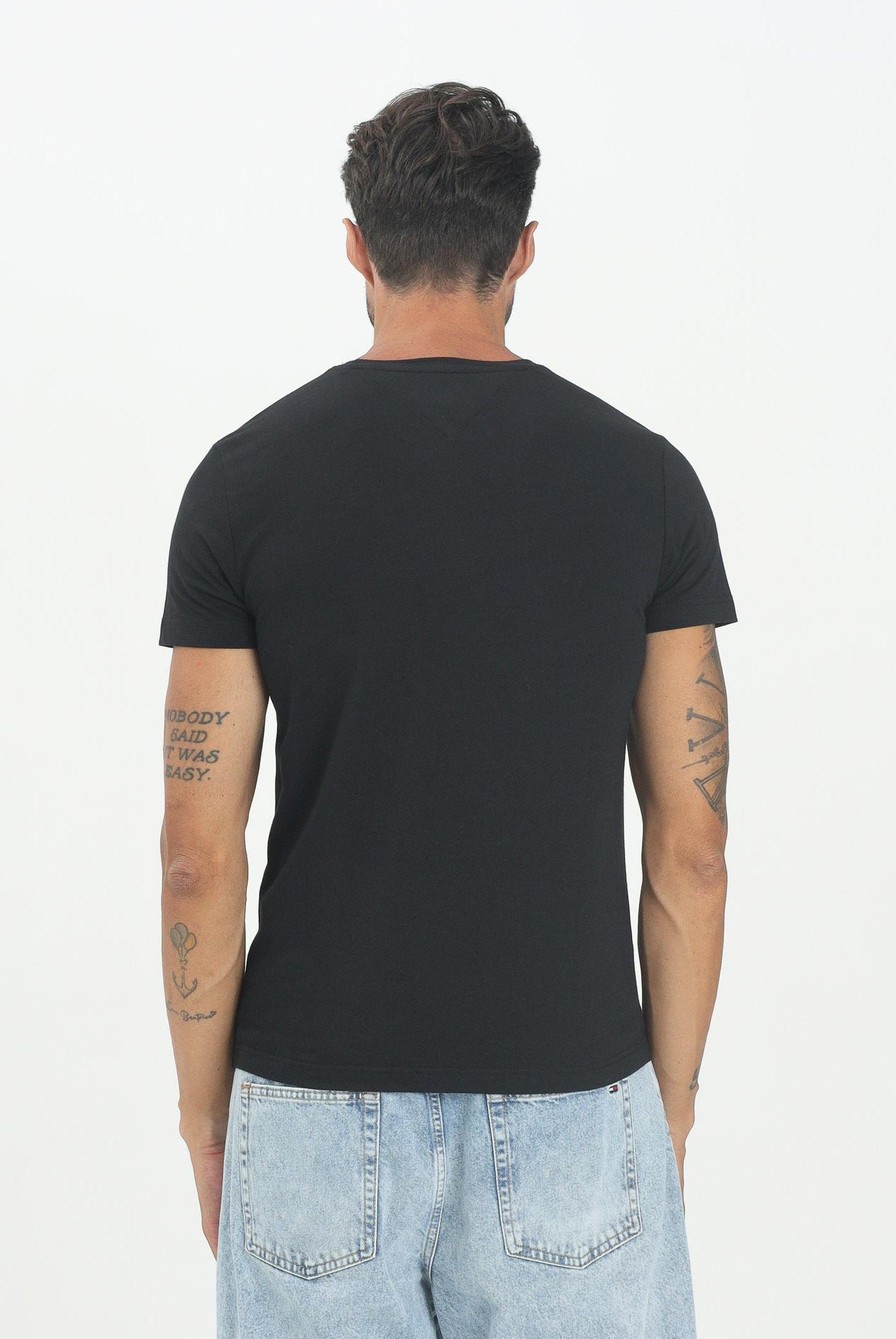 TOMMY HILFIGER T-shirt a manica corta TH Flex nera da uomo MW0MW27539BDS . TOMMY HILFIGER