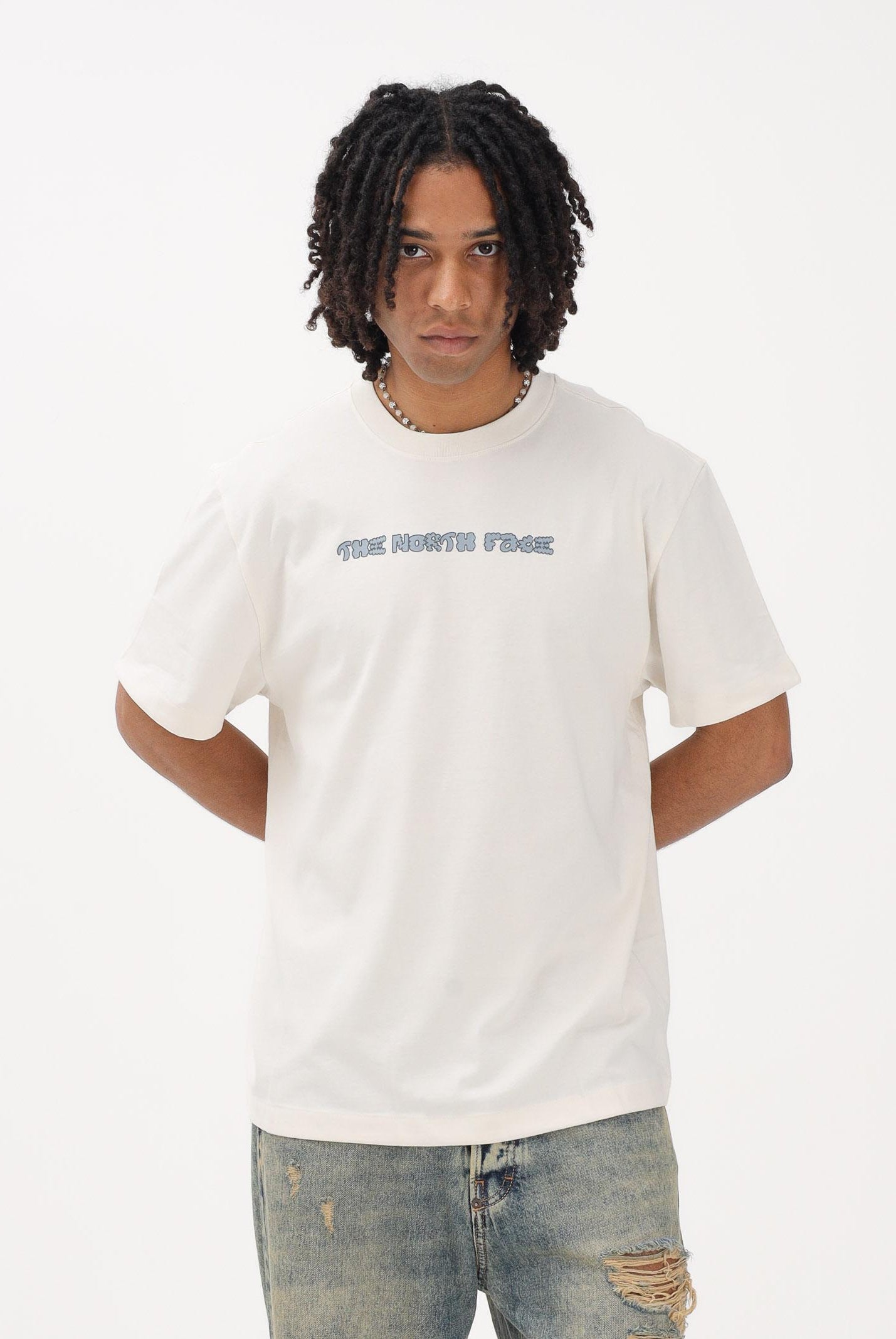 THE NORTH FACE T-shirt a manica corta Logo Twist Relaxed panna da uomo NF0A8GQVQLI1 . THE NORTH FACE