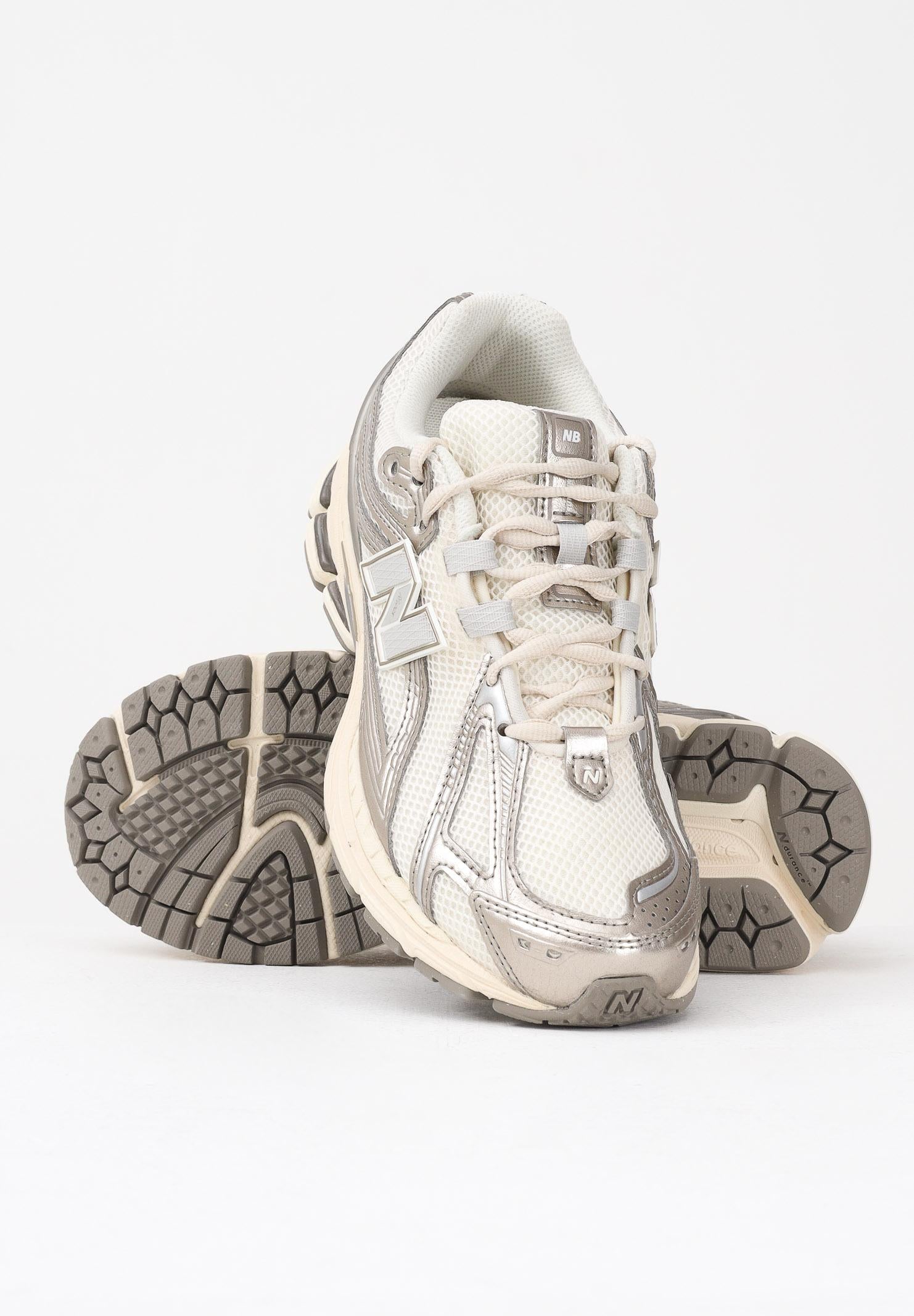 NEW BALANCE Sneakers 1906R panna e argento per uomo e donna U1906RCN . NEW BALANCE