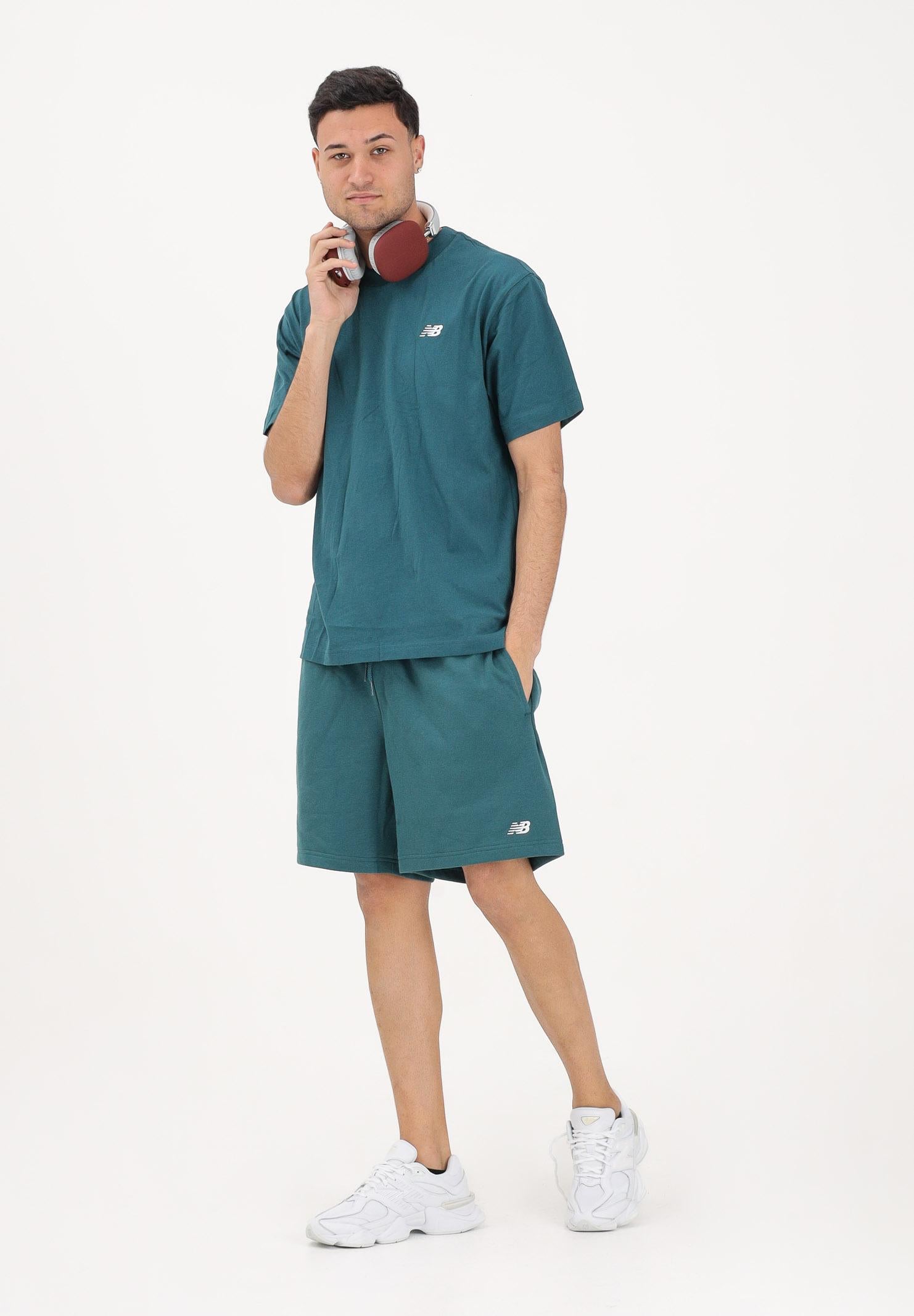 NEW BALANCE Shorts sportivo ESSENTIALS petrolio per uomo e donna MS41520AAV . NEW BALANCE