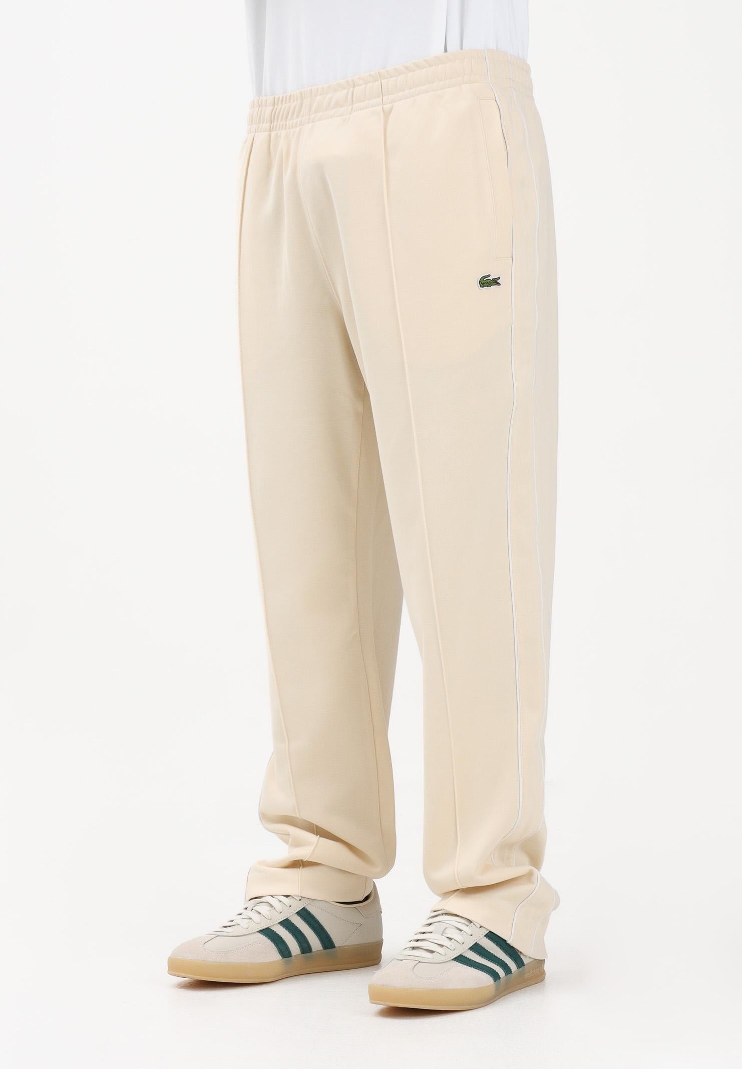 LACOSTE Pantalone sportivo crema da uomo in piqué con bordo XH0628 056 LACOSTE