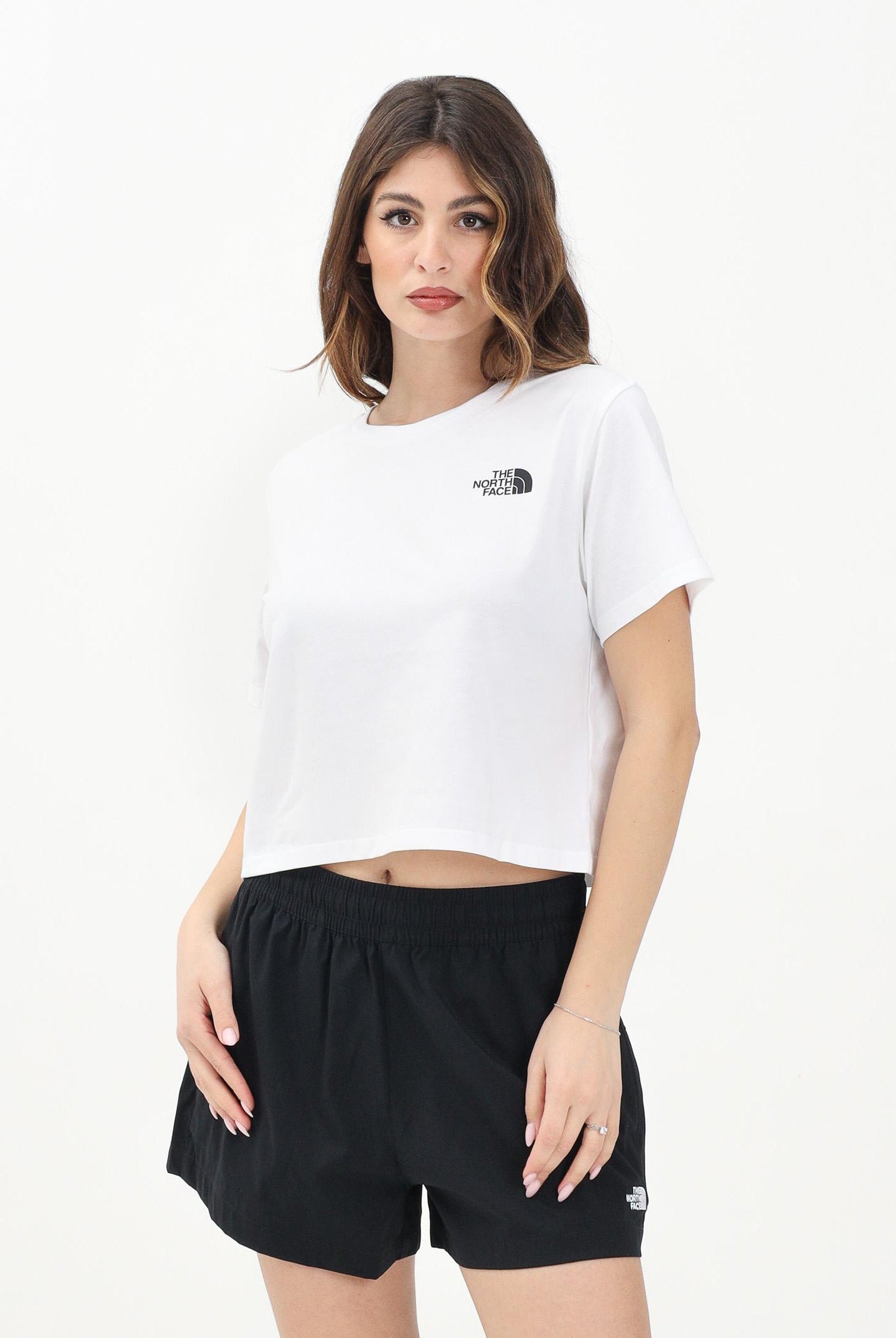 THE NORTH FACE T-shirt a manica corta Cropped bianca da donna con logo NF0A87U4FN41 . THE NORTH FACE