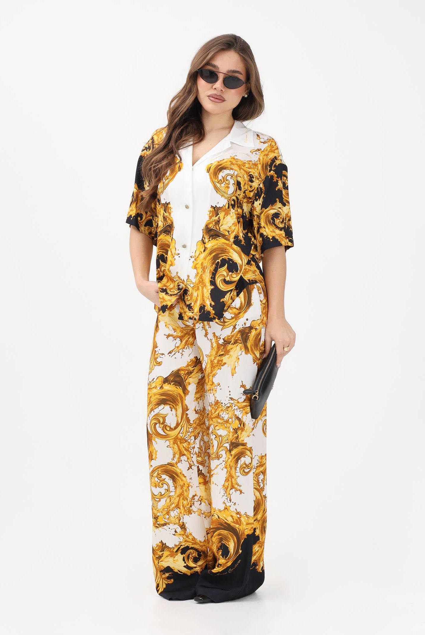 VERSACE JEANS COUTURE Pantalone bianco e nero da donna con stampa Wave Couture 80HAA1P2NS833 GL1 VERSACE JEANS COUTURE