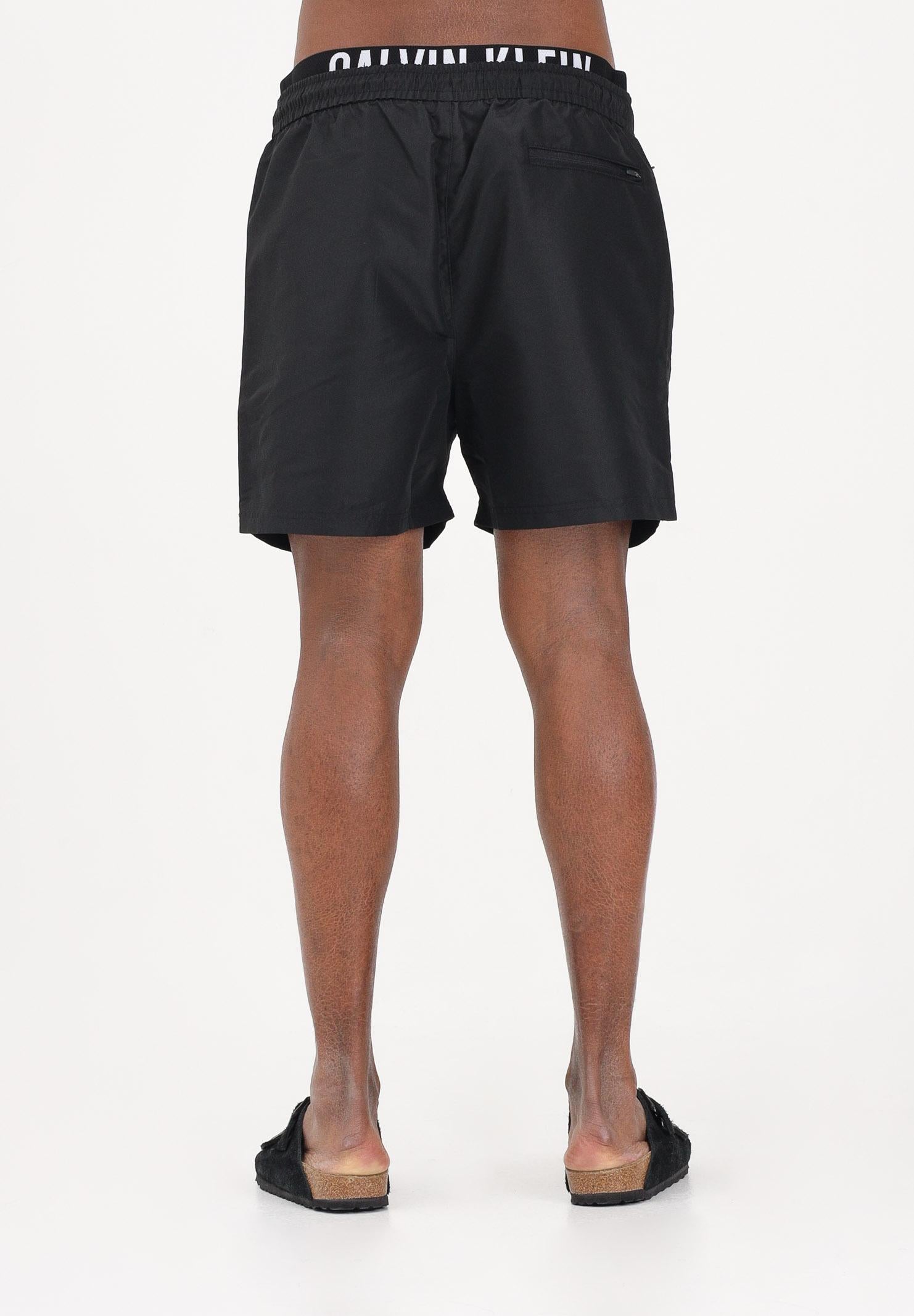 CALVIN KLEIN Shorts mare nero da uomo con elastico logato LV00N61015 UB1 CALVIN KLEIN