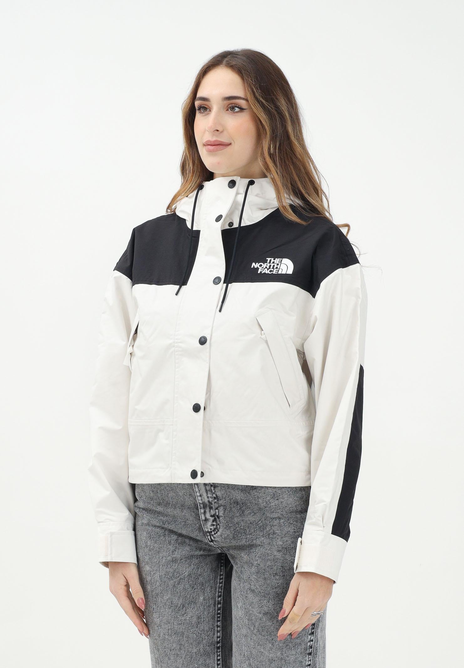 THE NORTH FACE Giacca a vento Mountain Mono nera e panna da donna NF0A8BCHROU1 . THE NORTH FACE