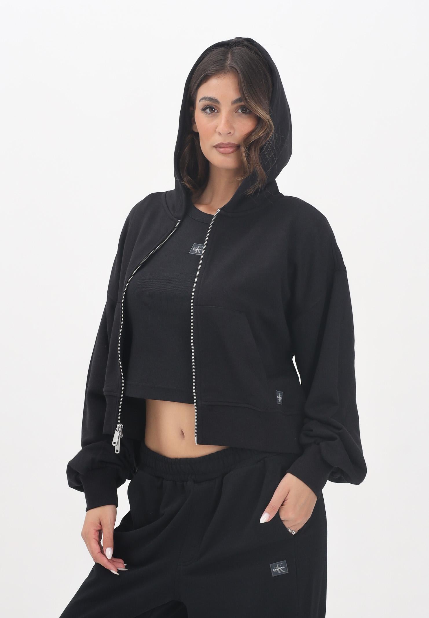 CALVIN KLEIN JEANS Felpa con zip nera da donna rifinita da logo LV047C216GUB1 CALVIN KLEIN JEANS