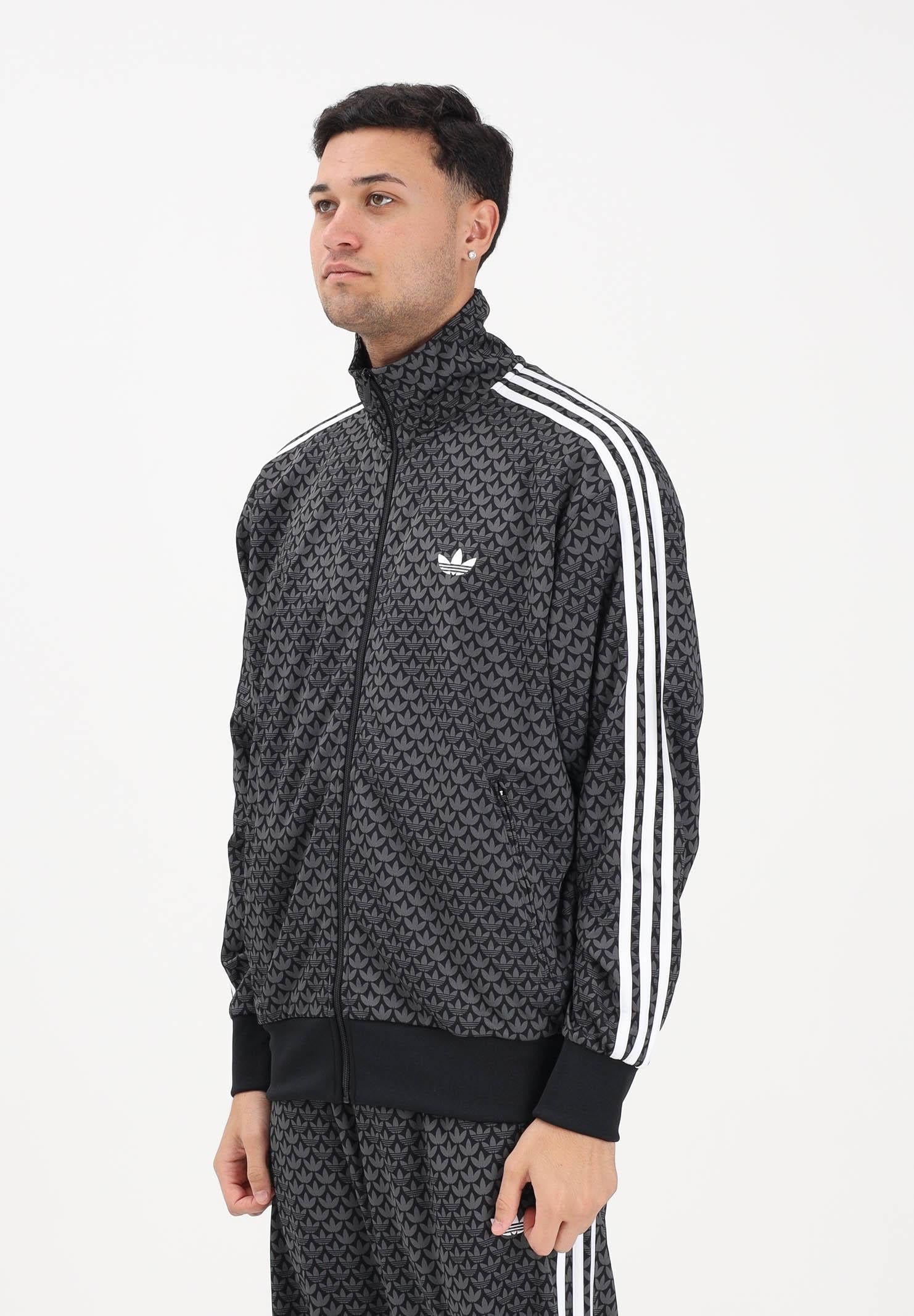 ADIDAS ORIGINALS Felpa con zip Loose Firebird Monogram nera da uomo KC9158 . ADIDAS ORIGINALS