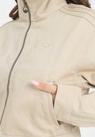 ADIDAS ORIGINALS Giubbotto Firebird Twill Crop in denim beige da donna JX7600 . ADIDAS ORIGINALS 