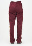 ADIDAS ORIGINALS Pantalone sportivo Adibreak bordeaux da donna KA7732 . ADIDAS ORIGINALS 