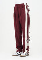 ADIDAS ORIGINALS Pantalone sportivo Adibreak bordeaux da donna KA7732 . ADIDAS ORIGINALS 
