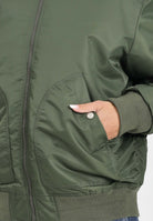 DIESEL Bomber verde militare per donna, ragazzi e bambini con maxi logo Oval Diesel J023980KAUX K513 DIESEL 