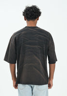 GCDS T-shirt a manica corta nera per uomo e donna con effetto lavato e stampa B2CM2315JF1 99 GCDS 