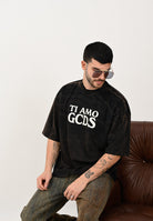 GCDS T-shirt a manica corta nera per uomo e donna con effetto lavato e stampa B2CM2315JF1 99 GCDS 