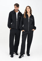 GCDS Pantalone sportivo nero per uomo e donna con lavorazione jacquard del logo B2CM3010TQ6 99 GCDS 