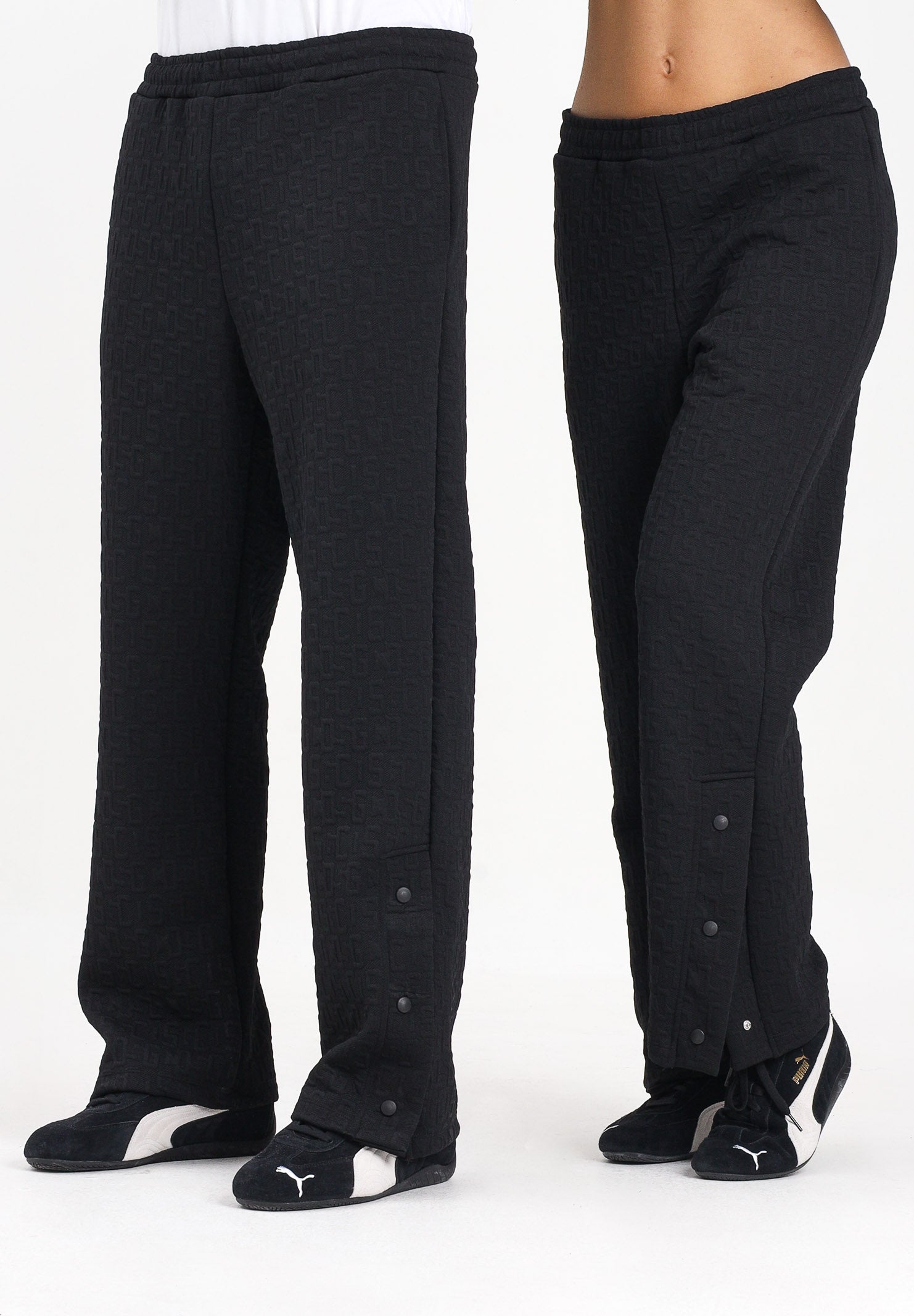 GCDS Pantalone sportivo nero per uomo e donna con lavorazione jacquard del logo B2CM3010TQ6 99 GCDS 