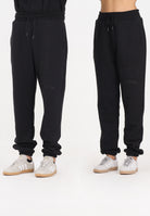GCDS Pantalone sportivo nero per uomo e donna con logo impresso B2EM3006JD1 99 GCDS 