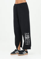 MAISON MARGIELA Pantalone sportivo nero per donna, ragazzi e bambini con spacchetti interni alla caviglia M60895MM02X M6900 MAISON MARGIELA 