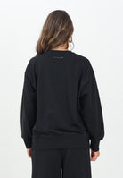 MAISON MARGIELA Felpa girocollo nera per donna, ragazzi e bambini con il logo Hand Written M60896MM02X M6900 MAISON MARGIELA 