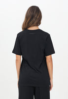 MAISON MARGIELA T-shirt a manica corta nera per donna, ragazzi e bambini arricchita da un logo Hand Written M60897MM02Y M6900 MAISON MARGIELA 
