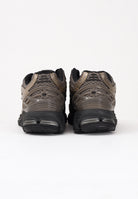 NEW BALANCE Sneakers 1906R nere, beige e oro da uomo U1906RCJ . NEW BALANCE 