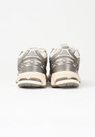 NEW BALANCE Sneakers 1906R panna e argento per uomo e donna U1906RCN . NEW BALANCE 