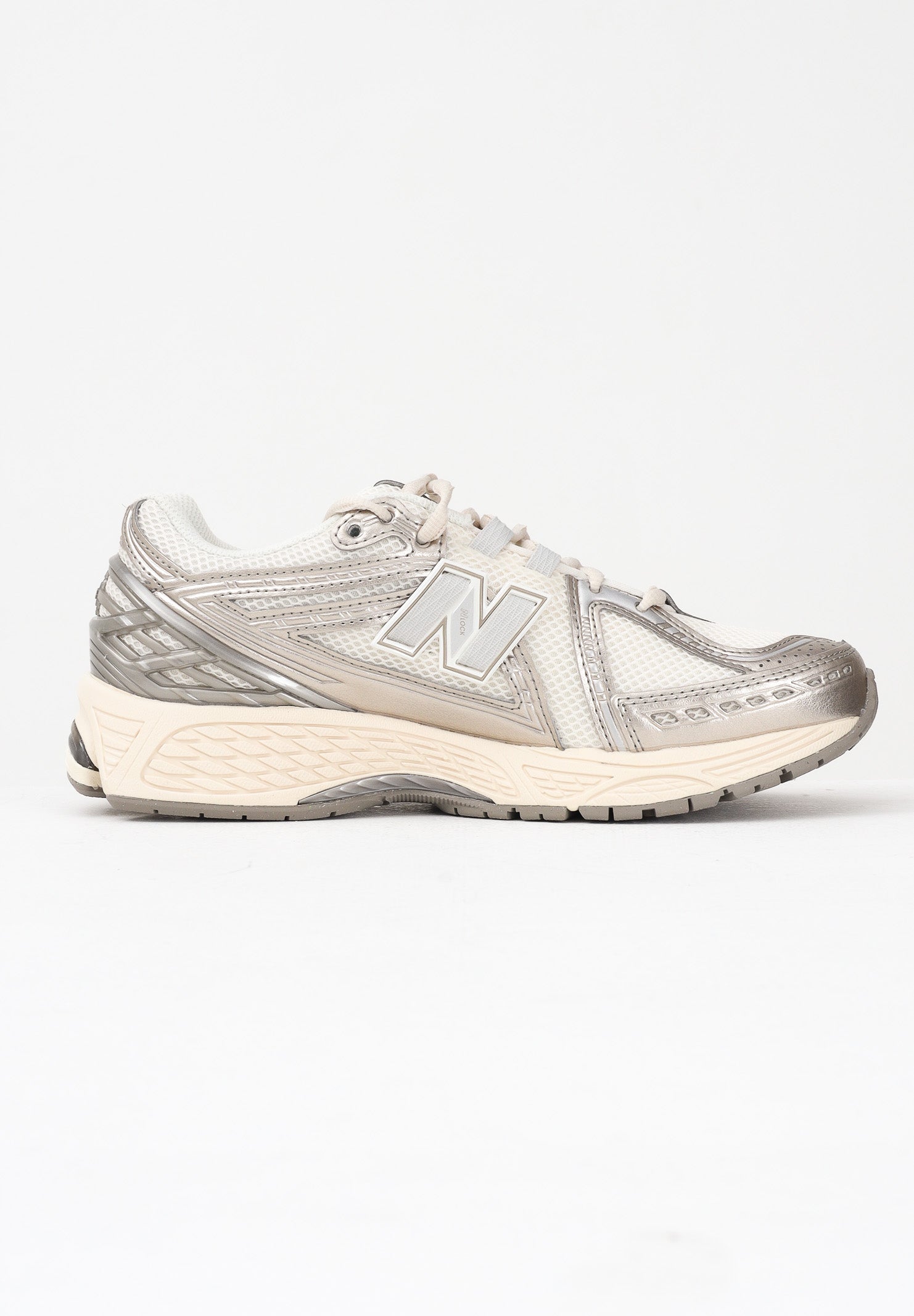 NEW BALANCE Sneakers 1906R panna e argento per uomo e donna U1906RCN . NEW BALANCE 