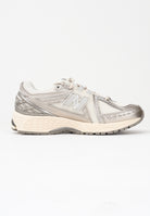 NEW BALANCE Sneakers 1906R panna e argento per uomo e donna U1906RCN . NEW BALANCE 