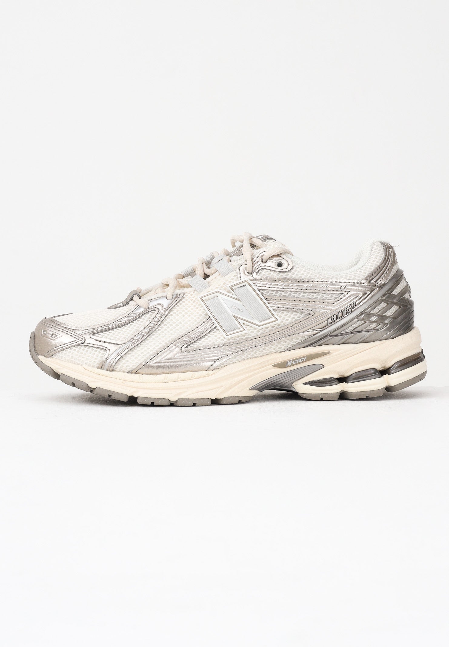 NEW BALANCE Sneakers 1906R panna e argento per uomo e donna U1906RCN . NEW BALANCE 
