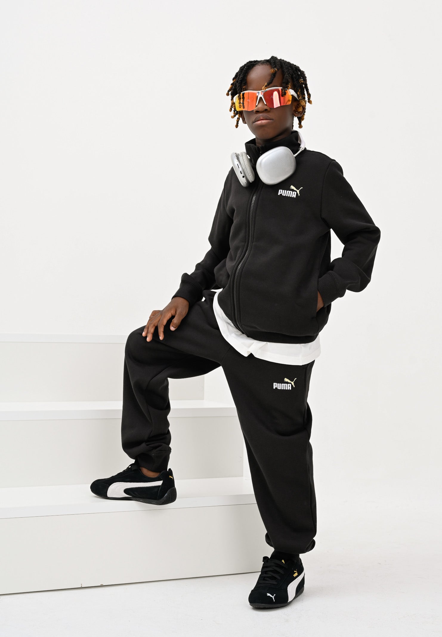 PUMA Tuta Essential nera per bambino e bambina 691934 01 PUMA 
