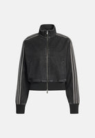 ADIDAS ORIGINALS Giacca FIREBIRD DENIM nera da donna con iconiche 3-Stripes sulle maniche. IB6917 . ADIDAS ORIGINALS 